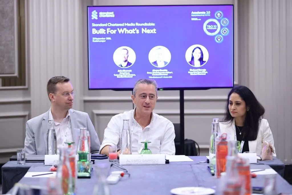 (L-R) Sharratt, Garrido and Baweja speak at the Media Rountable in Kuala Lumpur, Malaysia